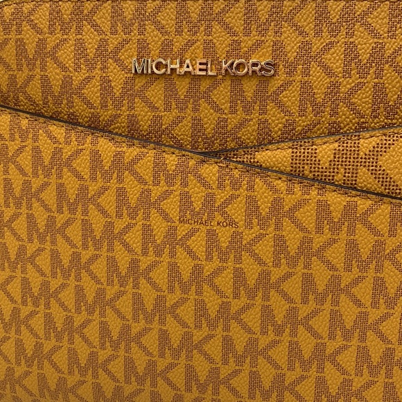 Michael Kors Medium Dome Xcross Xbody Bag
Color: Marigold Multi - Picture 6 of 15